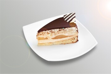 Cheesecake with Lemon Meringue and sause on the plate