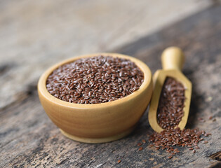 flax seeds on wooden background