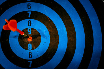 Bullseye is a target of business. Dart is an opportunity and Dartboard is the target and goal. So both of that represent a challenge in business marketing as concept.	
