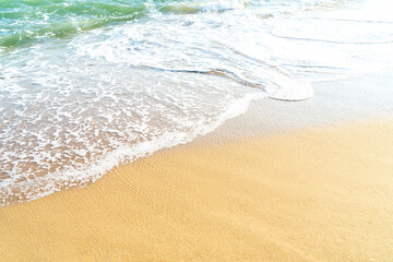 Clean sand texture with sea wave.Sea tropical sandy beach for Summer background banner