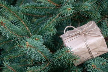Wrapped gifts on the a Christmas tree with copyspace. Christmas gift box