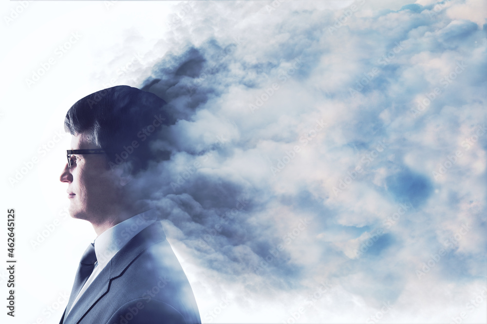 Aufkleber abstract head in clouds concept. male silhouette on white sky background with mock up place. double 