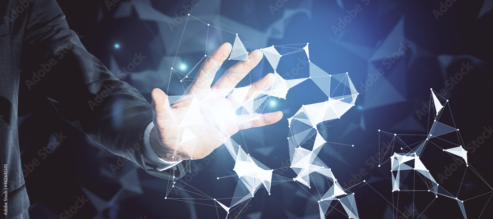 Aufkleber businessman hand reaching for abstract glowing polygonal connections interface on dark background. w