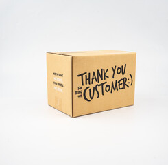 A closed cardboard box taped up, and there is a Thank you for being our customer beside the parcel box for delivery and shopping online concept design isolated on white background.