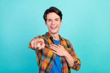 Photo of guy indicate finger you laugh hand chest have fun wear plaid shirt isolated aquamarine...