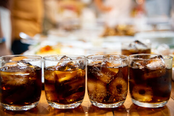Refreshing Bubbly Soda Pop with Ice Cubes. Cold soda iced drink in a glasses - Selective focus, shallow DOF.	
