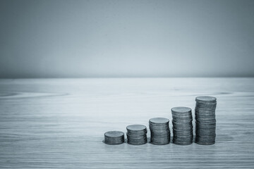 Gold coins stacks is representing riches and wealth management. Coin stack growing and find out the...