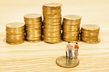 Gold coins stacks is representing riches and wealth management. Coin stack growing and find out the way to get a return on investment. Finance and money exchange investment as concept.