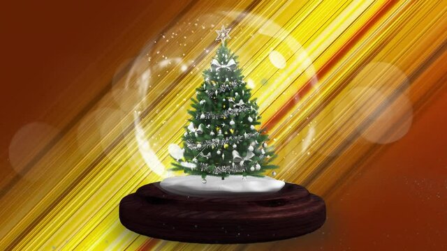 Shooting star around christmas tree in a snow globe against yellow light trails on red background