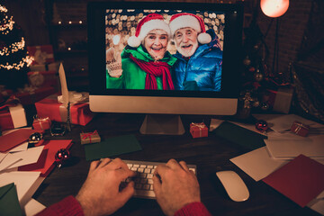 Photo of charming funny age santa claus hands wear red costume typing modern device indoors house room