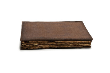 An old brown book isolated on white background.