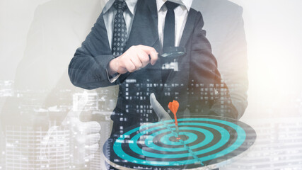 Double exposure of young business man and digital number of stock market background to represent successful in investment marketing. Find out the best solution in business and financial as concept.	
