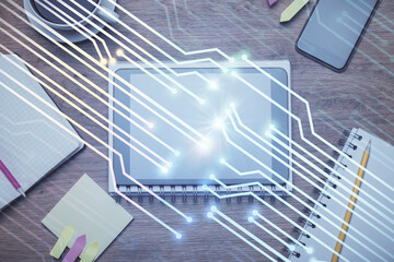 Double exposure of technology theme drawing over work table desktop. Top view. Global data analysis concept.