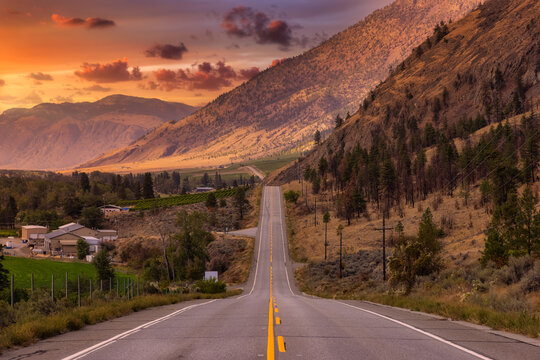 Scenic Road, Hwy 3, in the valley around the Canadian Mountain Landscape. Colorful Sunset Sky Art Render. Near Osoyoos, British Columbia, Canada.