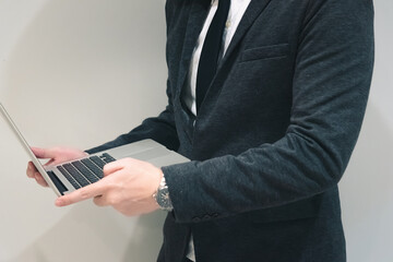 Young business man and digital number of stock market background to represent successful in investment marketing. Find out the best solution in business and financial as concept.