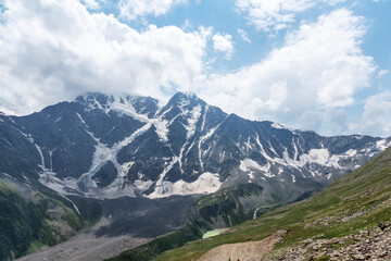 Obraz premium View of Cheget mountain in Caucasus with famous glaicer calles Seven, famous view, treking in beautiful places