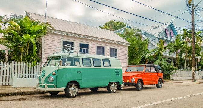Key West, FL, US-Dec. 28, 2016:  Blue-green VW combi camper van parked on street.