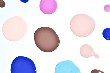 Nail polish (enamel) mixed multicolor samples, isolated on white background