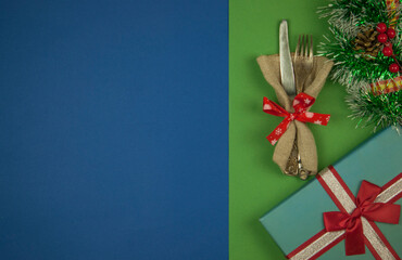 Vintage silverware decorated with red ribbon