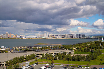 Panorama of Kazan. View of the Kazanka River and Novo-Savinovsky District. City landscape with clouds - 462657704