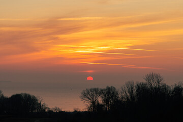 The sun rising from the Atlantic Ocean 