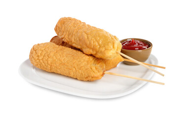 Delicious deep fried corn dogs with ketchup on white background