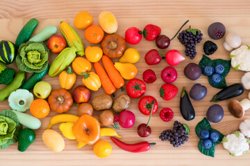 fruit and vegetables arranged as a rainbow