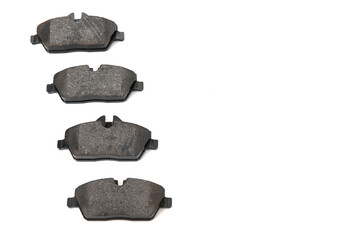 a stack of brake pads on a white background