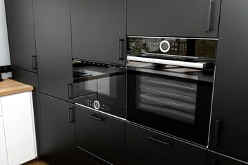 Modern kitchen with black fronts, built in oven and microwave, vinyl panels on the floor.