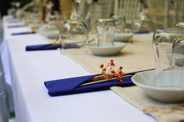 Beautiful table setup with orange flowers