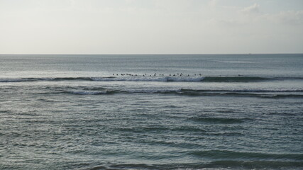 beautiful composition surfers waiting for the waves surf Indonesia perfect beach exotic paradise Indonesia Bali Balangan summer late afternoon sunset