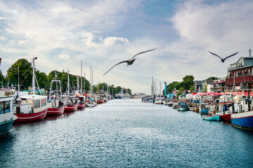 canal with ships and Baltic Sea in Warnemuende, Rostock Germany
