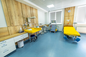 Empty light emergency ward. Modern clinical indoor sterile interior.