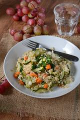 brown rice with zucchini, carrots and parsley - closeup