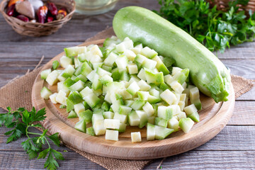 Frozen zucchini on a cutting board on a table