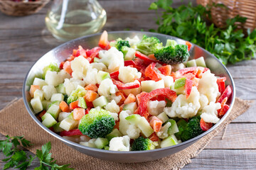 Frozen vegetables in bags, cold healthy diet food. Frozen food