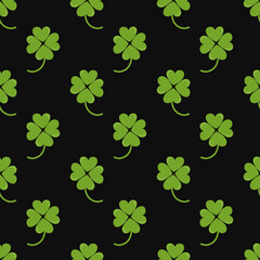 Clover vector seamless pattern on a black background, trendy illustration for printing clothes, paper, fabric.