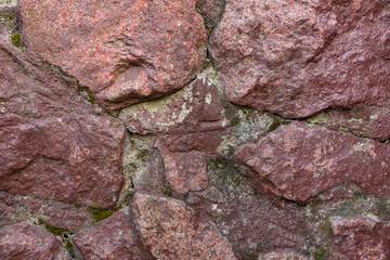 Texture of stones of red color large size, large red stones close-up texture, red stone texture