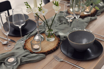 Festive table setting with beautiful tableware and decor