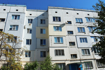 Obraz premium Multi-apartment five-story panel house, Khrushchev, a residential area of ​​a city in Ukraine, built during the USSR period
