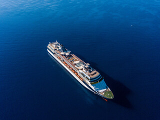 Top view from drone on cruise liner in the blue sea