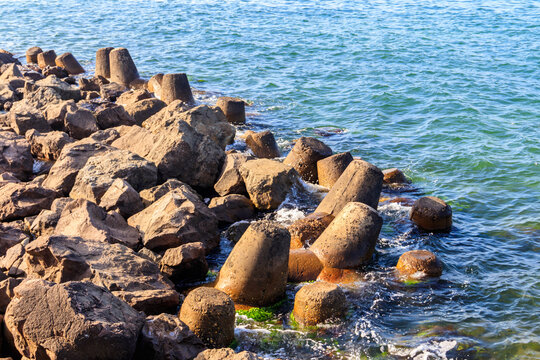 Concrete breakwaters at the coast of the Black sea. Protection for the shore structure against high waves