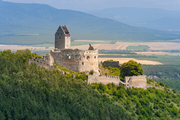 Castle ruins of Topolcany, old castle breakaway in Slovakia. Tourist attraction, tourism destination. Slovak historical castles, chateaus and churches.