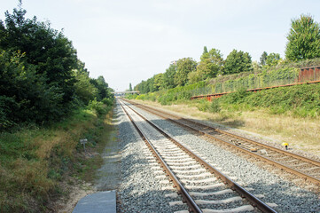 Fototapeta na wymiar Railway that goes on to infinity in Nijmegen in the Netherlands