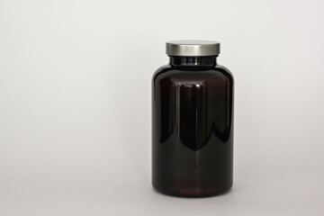 Black Plastic Bottle for Pills Packing with Chrome Metallic Lid. 