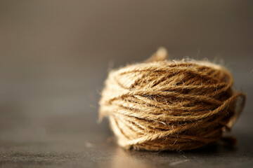 a bundle of yarn on a gray background