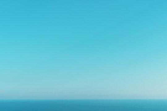 A perfect horizon between the blue sky and the sea.