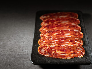 salami on a marble plate 