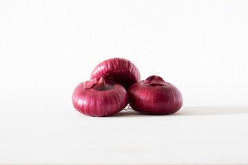 Crimean red onion on a white background