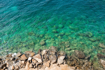 Fototapeta na wymiar aerial top wiev of summer beach and blue sea.Free space for your decoration and summer sunny day.